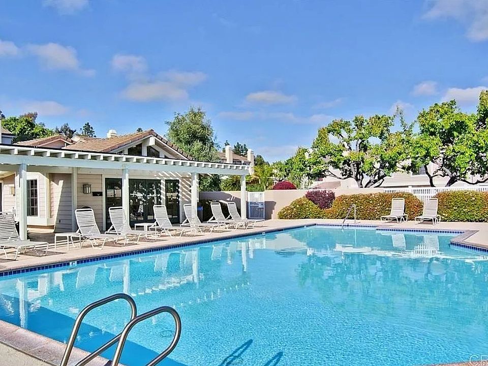 Pool / spa and patio with barbecue and clubhouse