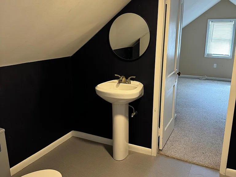 Upstairs 1/2 Bath, leading to 3 bedroom