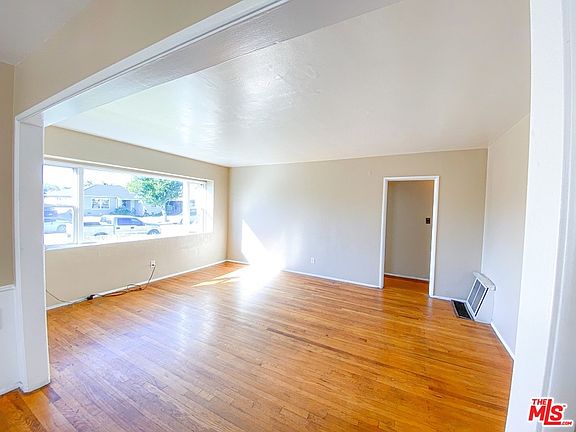 4th image of 11712 Simms Ave