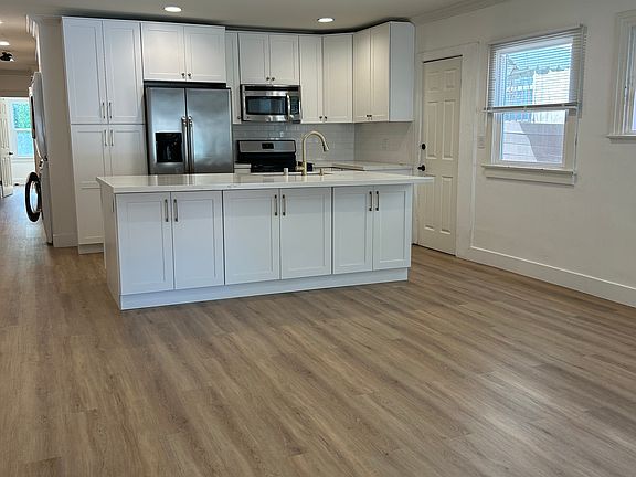 Brand new oak floors and recessed lighting