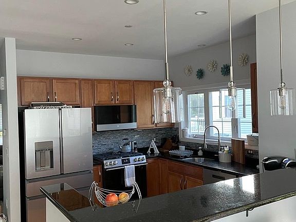 Kitchen with updated GE Cafe appliances