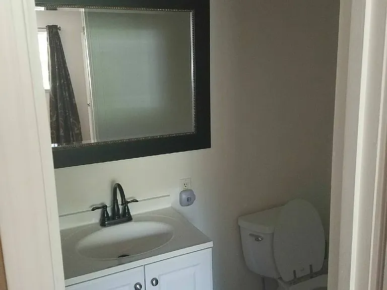 Bathroom with ample storage.