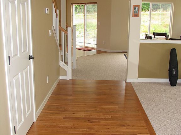 Red Oak Hdwds and Berber Carpet