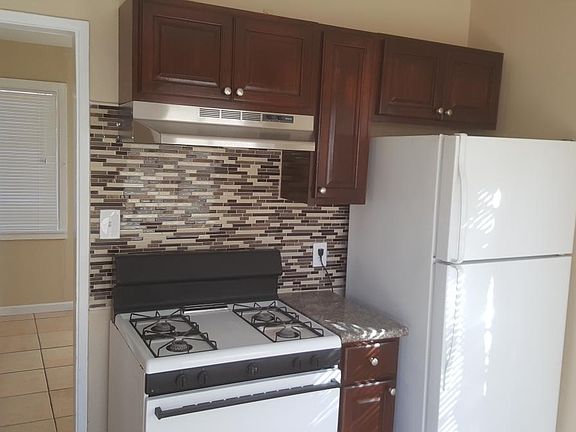 Range + Fridge Included