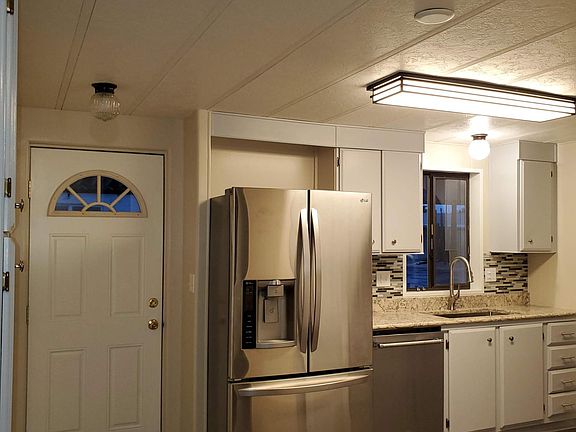 Kitchen with new refrigerator & dishwasher