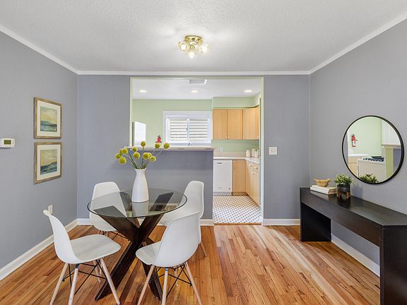 Photo of furnished unit next door for reference...dining area