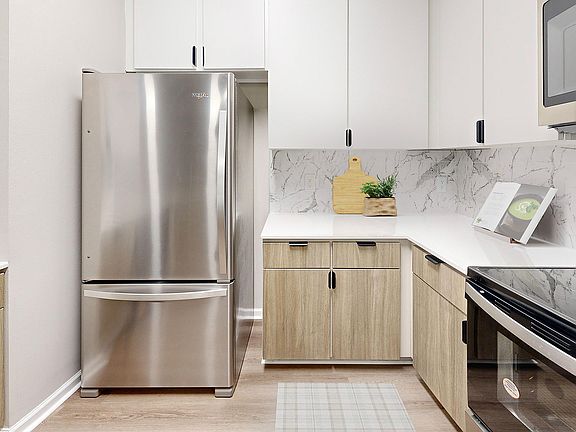 Spacious kitchen with stainless steel appliances