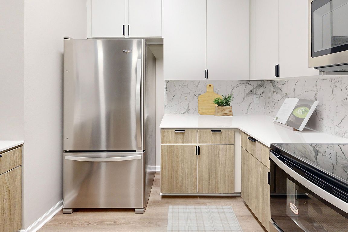 Spacious kitchen with stainless steel appliances