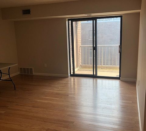 living area and door to balcony