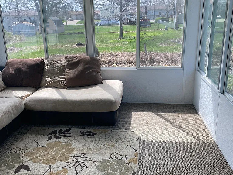 Sunroom overlooks big back yard!