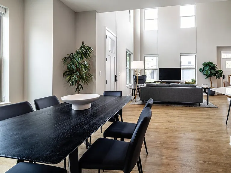 Signature Collection Townhome dining and living room area with hard surface flooring