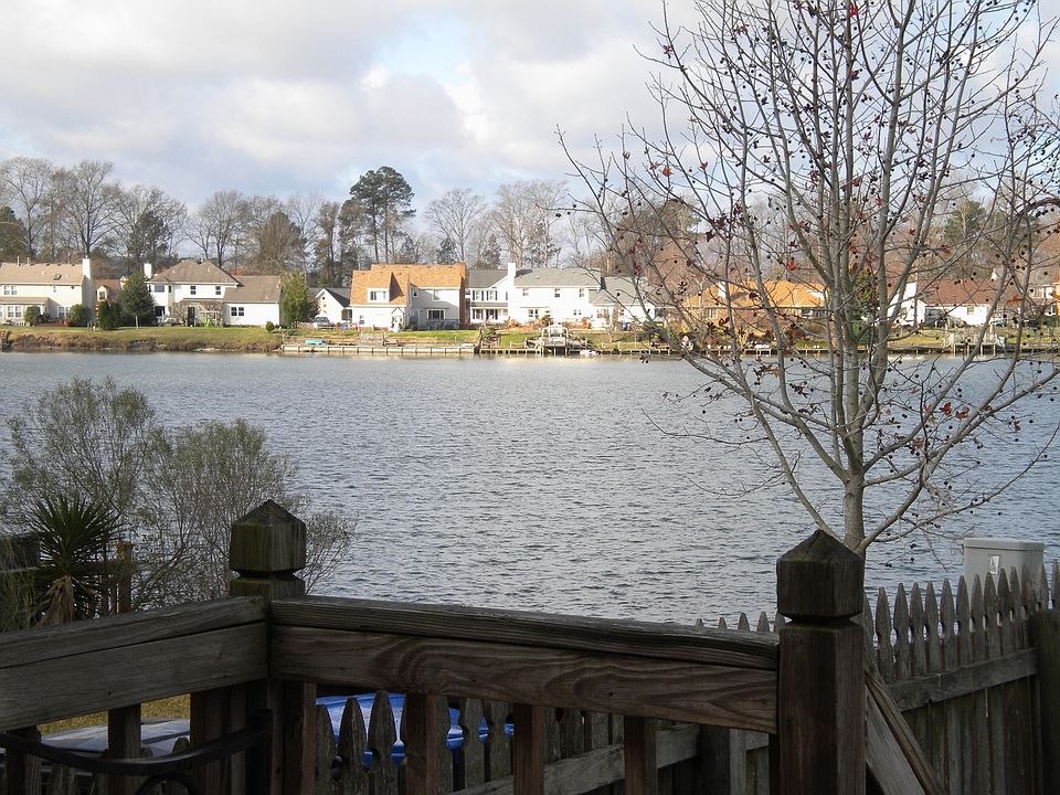 Deck and balcony overlook the lake