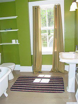 Main Floor Bath - fully refurbished 2001.  Notice the beautiful clawfoot tub...and this is one of two beautiful tubs like this!
