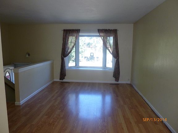 Upper living room with bay windows