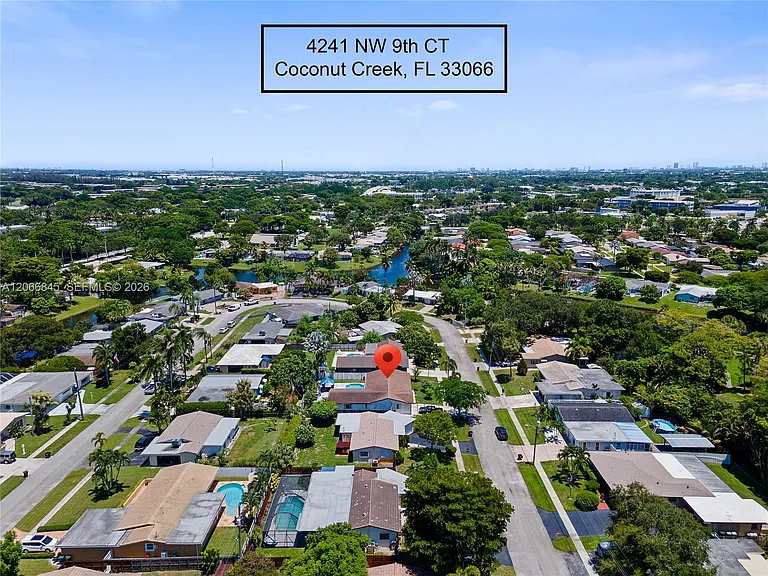 4241 NW 9th Ct #EFFICIENCY — Photo 1