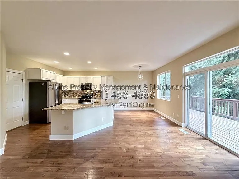 5758 NE Damsel Dr — Photo 6