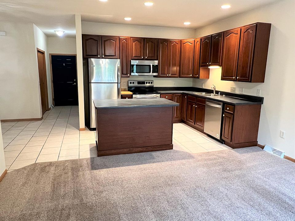 Garage access, coat closet, laundry room down the hall