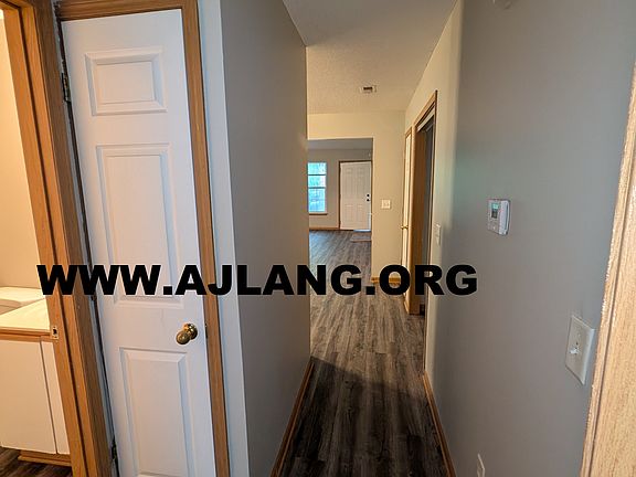 HALLWAY LOOKING AT FRONT DOOR