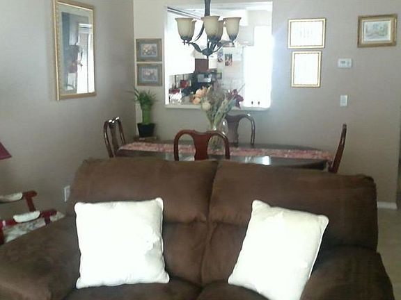 Living room looking toward dining room and kitchen