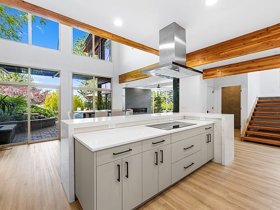 Kitchen and Dining Room open to Living Room and outdoor Patio.