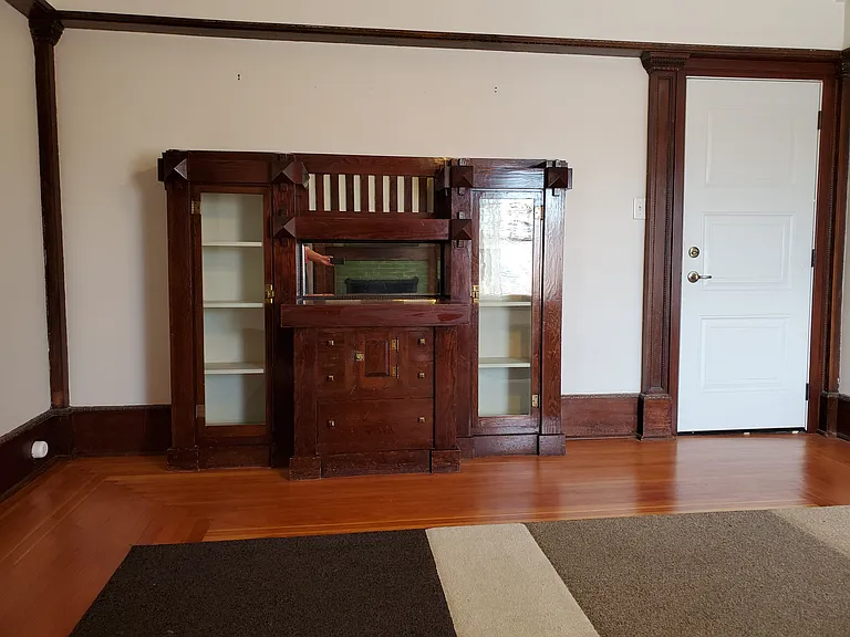 Living Room Built in cabinet with a ledge that works well for a smaller TV.