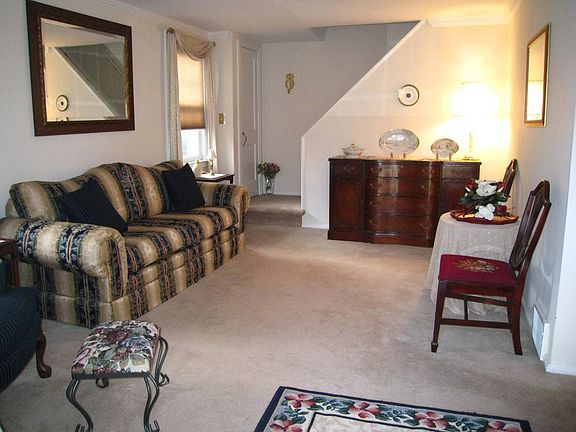 living room with crown molding