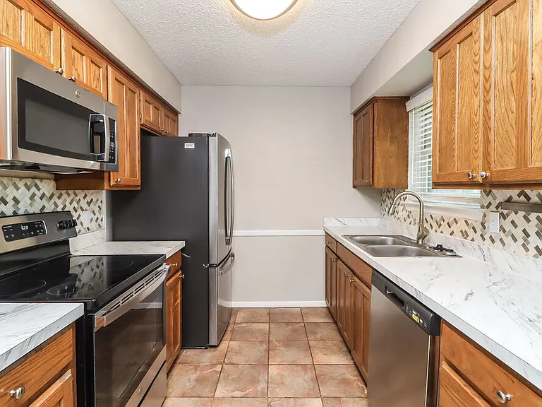 5911 Woodsetter Ln — Photo 9