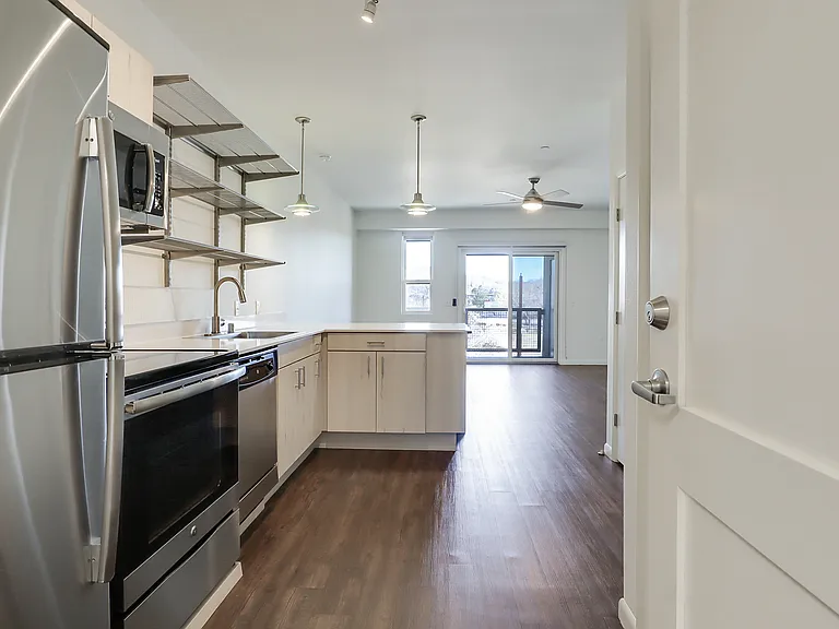 315 pictured. 207 has mirror/flipped "Chile Line" layout, but same appliances and finishes.