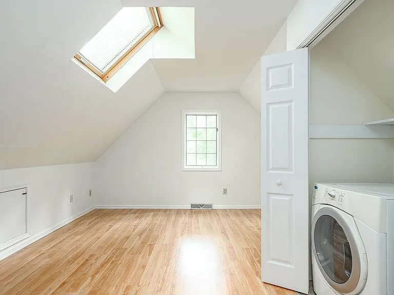 First bedroom upstairs with washer/dryer included