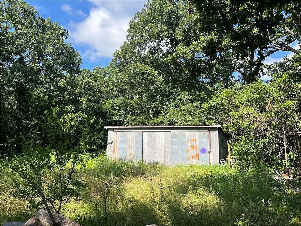 1st image of 647 NE 185 Pvt Rd