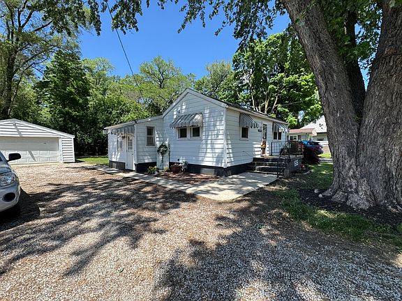 Large driveway for extra parking and large privacy fence in the back yard 75 percent fenced in yard.