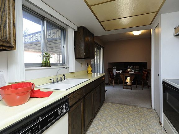 Nice size kitchen with a view of the backyard