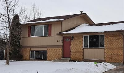 Brick and wood construction.  Notice the garden level lower level!