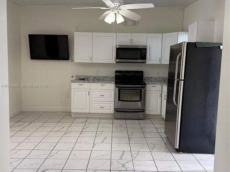 46 NW 58th Ct — Photo 3