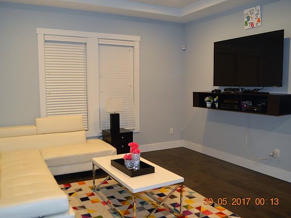 Fully furnished living room, with brand new flat screen, and