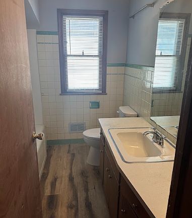 New Flooring, new surround, new toilet!