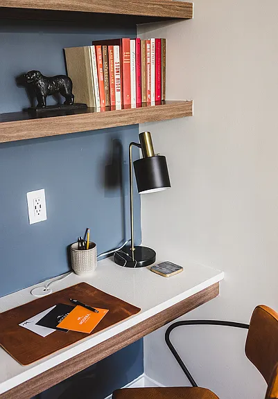 Built-in desk with USB ports and custom book shelves
