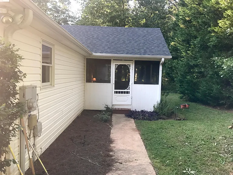 Sidewalk to screened porch