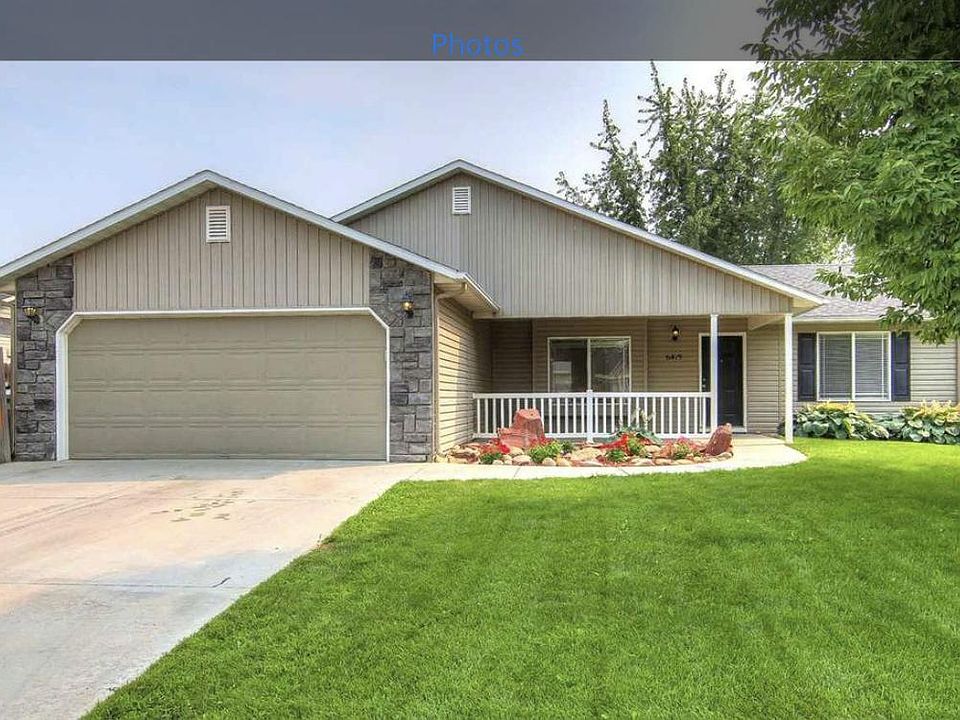 2 car garage, street view, gates to left for enclosed small RV parking