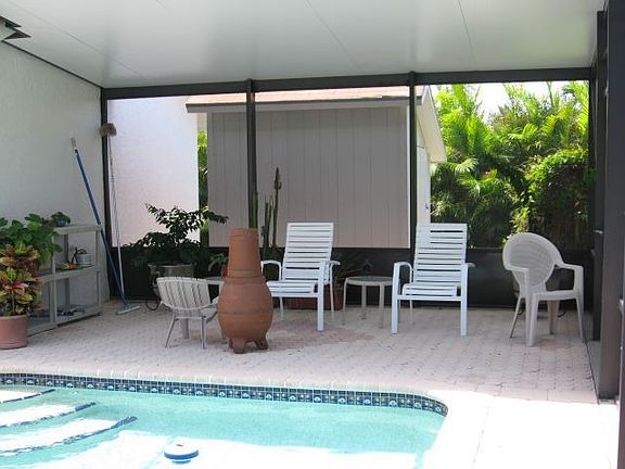 Roofed BBQ Shade area by Pool 
