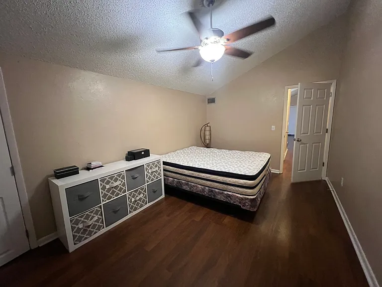 Bedroom including small side closet.