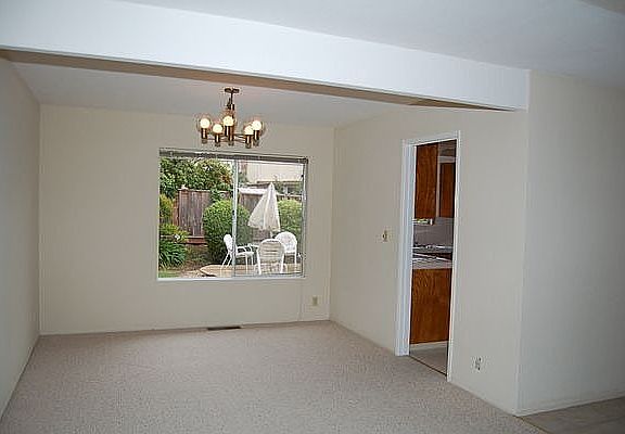 Formal Dinning over looking the backyard