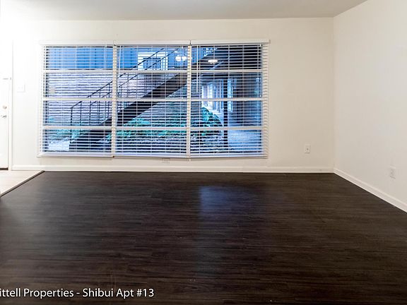 Living area and large window allows great natural light.