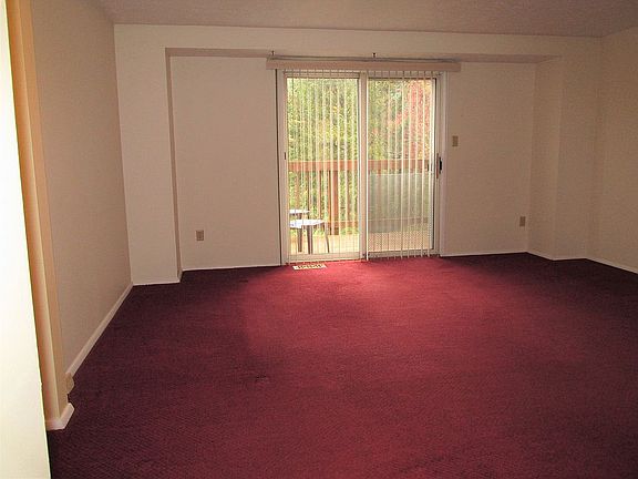 Living room opens to deck.