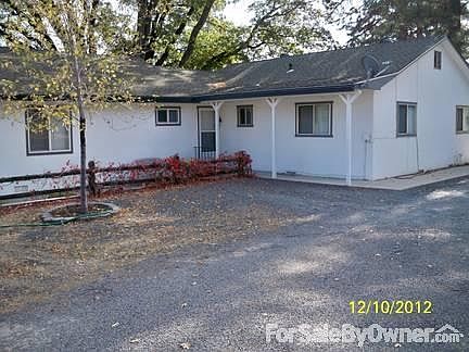 Front Entrance
						:
						Large Driveway to the front entrance allows parking without obstructing Garage.