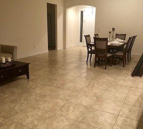 Marble floors throughout dining room, kitchen and living roo