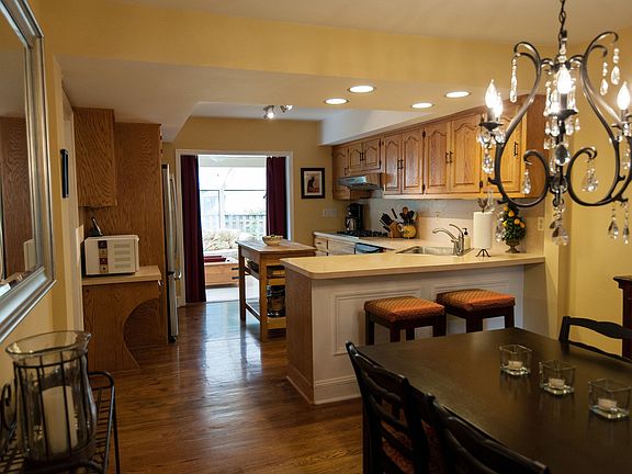 Kitchen Opens to Sun Room & Deck