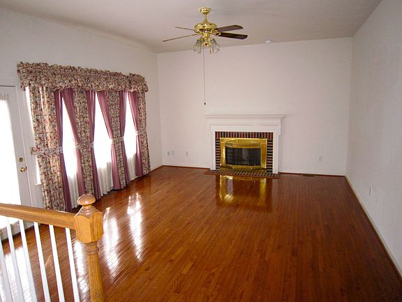family room with fireplace and door to deck