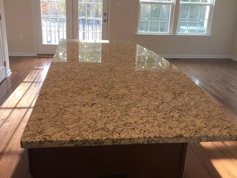 kitchen island with hangover granite for breakfast bar