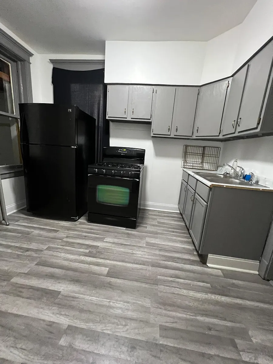 Building Photo - 6432 S Peoria St #1
